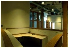 Before:	interior view of front entrance before rehabilitation